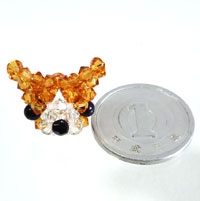 Coin(2cm in dia.) in Japan and Welsh Corgi