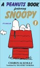 A peanuts book featuring Snoopy (1) �\��