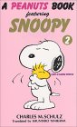 A peanuts book featuring Snoopy (2)