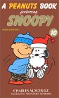 A peanuts book featuring Snoopy (10) �\��